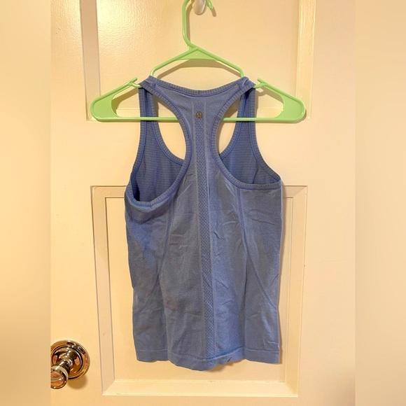 2 older lulu swiftly tech tank tops - Picture 4 of 9